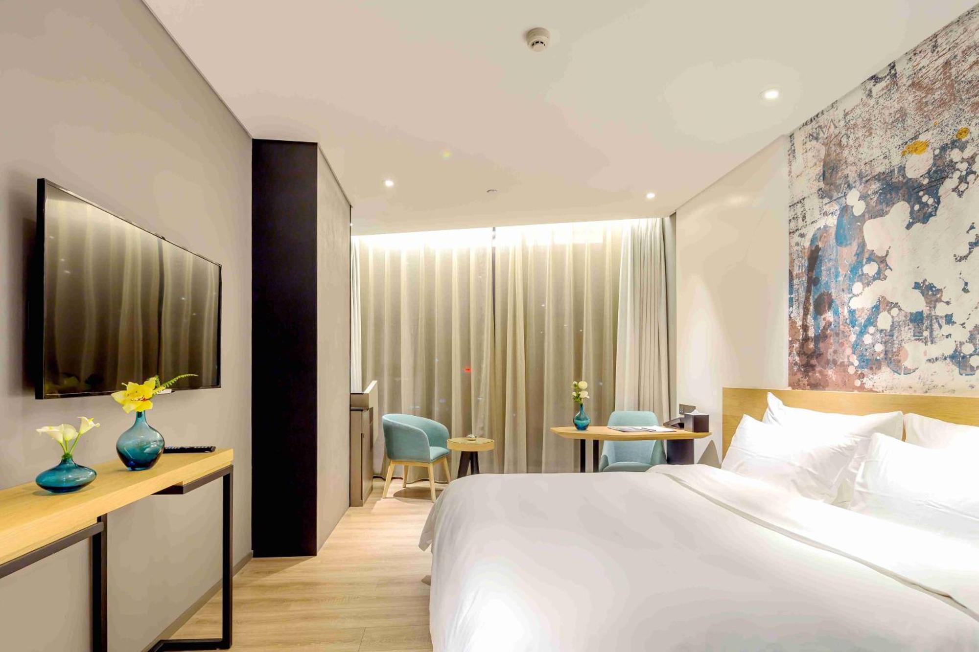 M Hotel Zhengzhou Esterno foto
