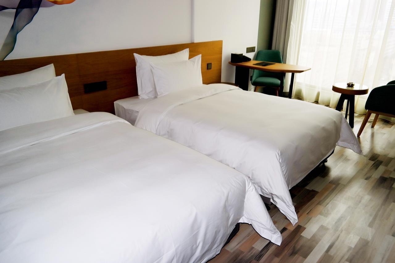 M Hotel Zhengzhou Esterno foto